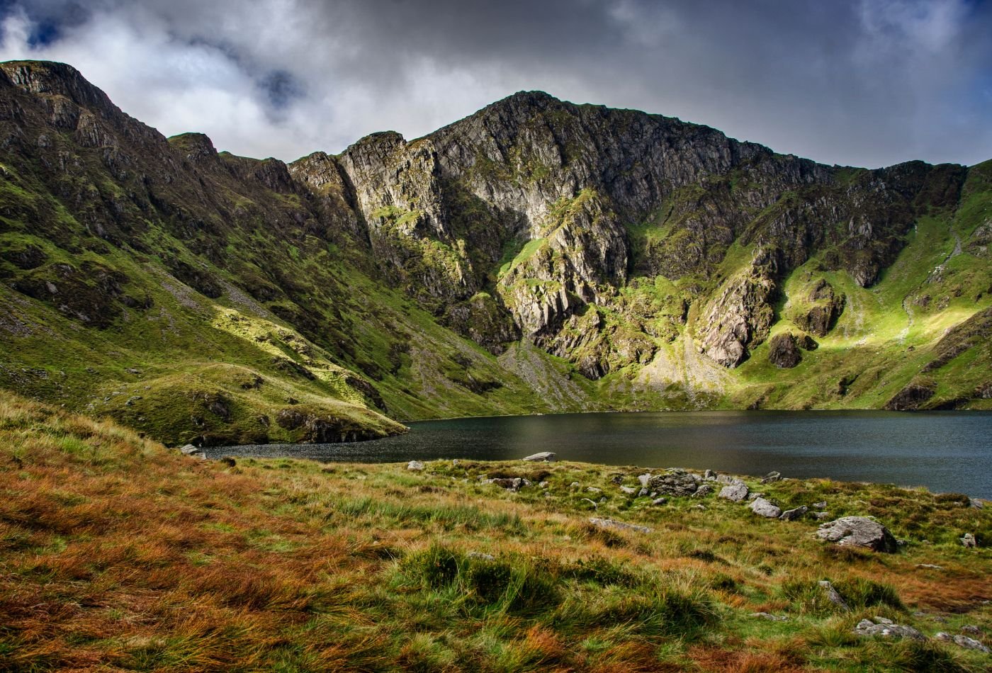 Llyn Cau glacial lake beneath the cliffs of Cadair Idris, Eryri National Park, near Tywyn, Wales