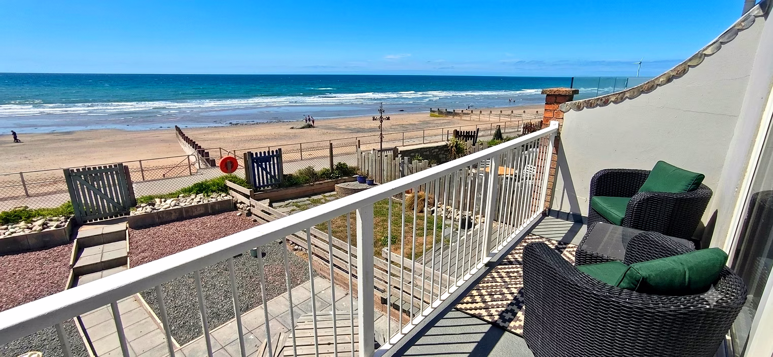 Venedotia balcony with panoramic Cardigan Bay views at sunset